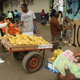 A street fruit vendor counts his Zimbabwe bond notes in Harare.